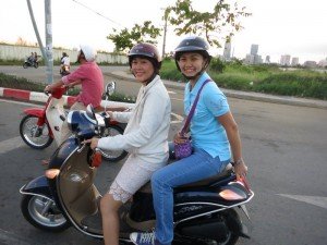 riding motorbike in Saigon with our Vietnamese friend